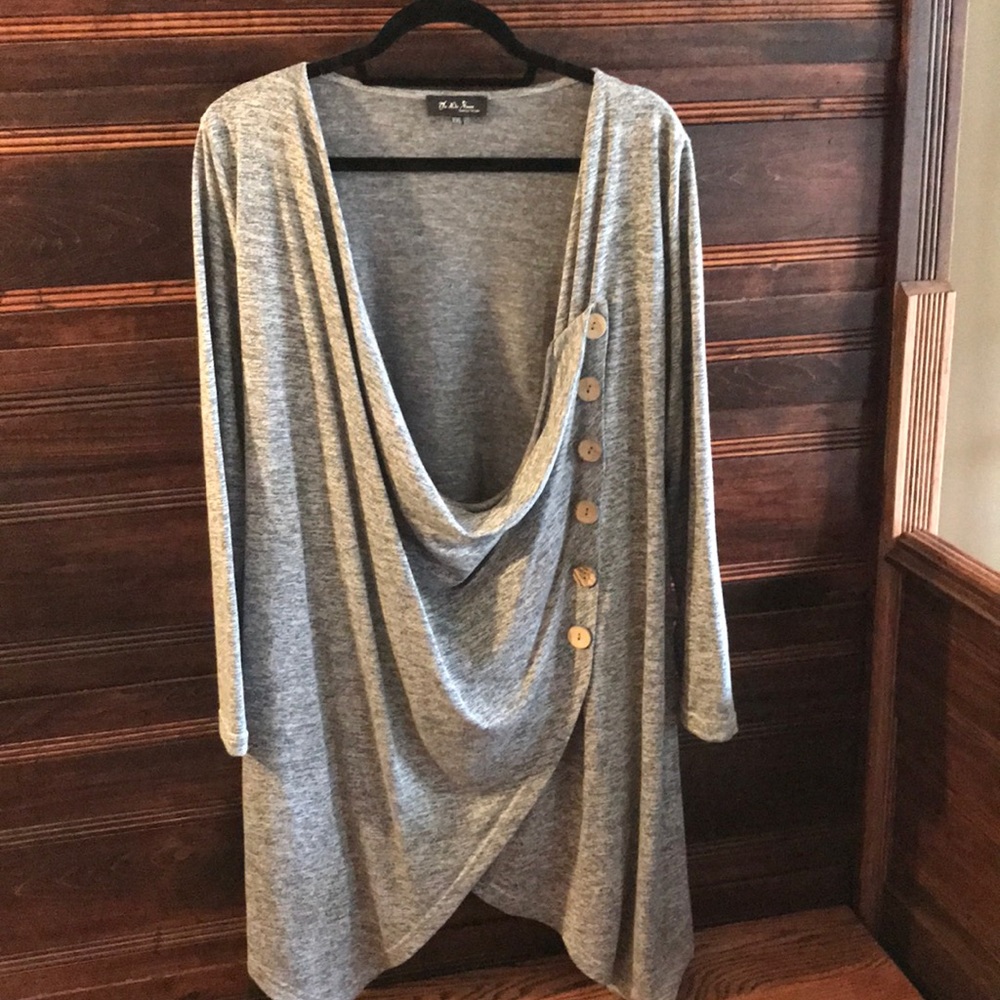 Grey sweater with wooden buttons
